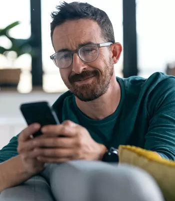 man using banking app on cell phone