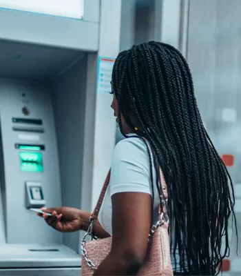 woman using ATM