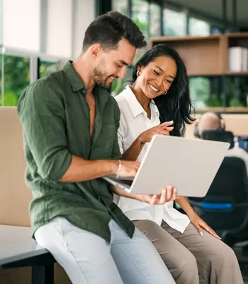 couple reviewing their finances on computer