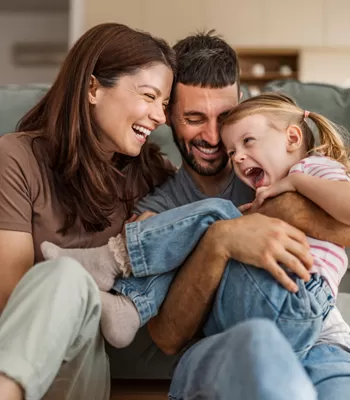 happy family in living room together