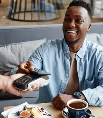 man paying for bill with digital wallet
