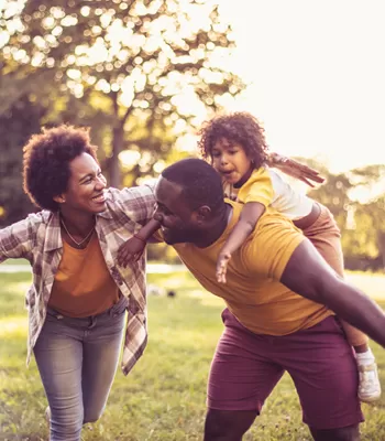 happy family in field