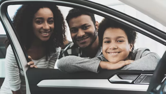 family in car