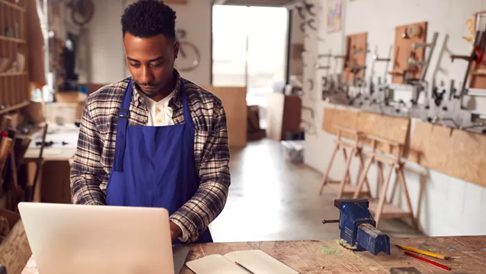 man working inside business