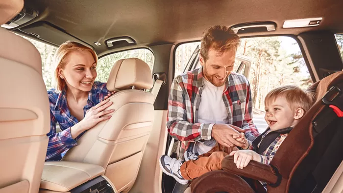 family in car