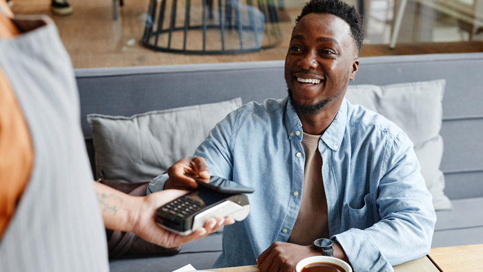 man paying with his digital wallet