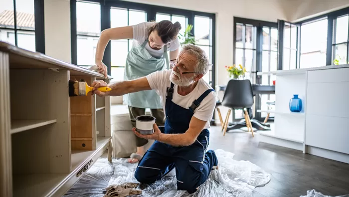 father and daughter working on kitchen renovations