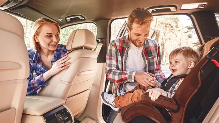 family in car