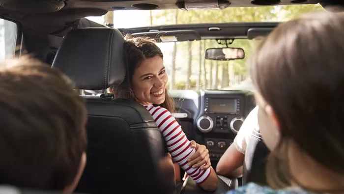 family in car