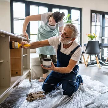 father and daughter completing kitchen renovation