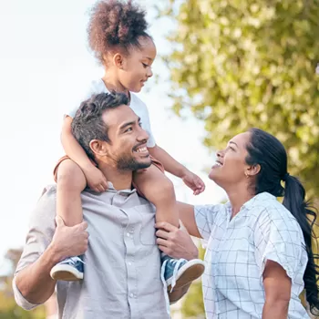 happy family in a field