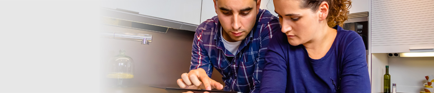 Couple using tablet