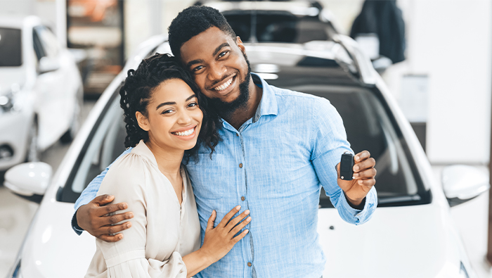 couple buying car